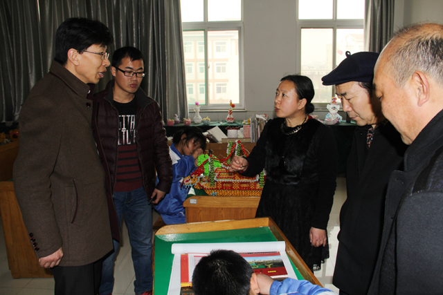 日照市教育局有關(guān)領(lǐng)導(dǎo)到我?？疾鞂W(xué)校建設(shè)及教育教學(xué)情況